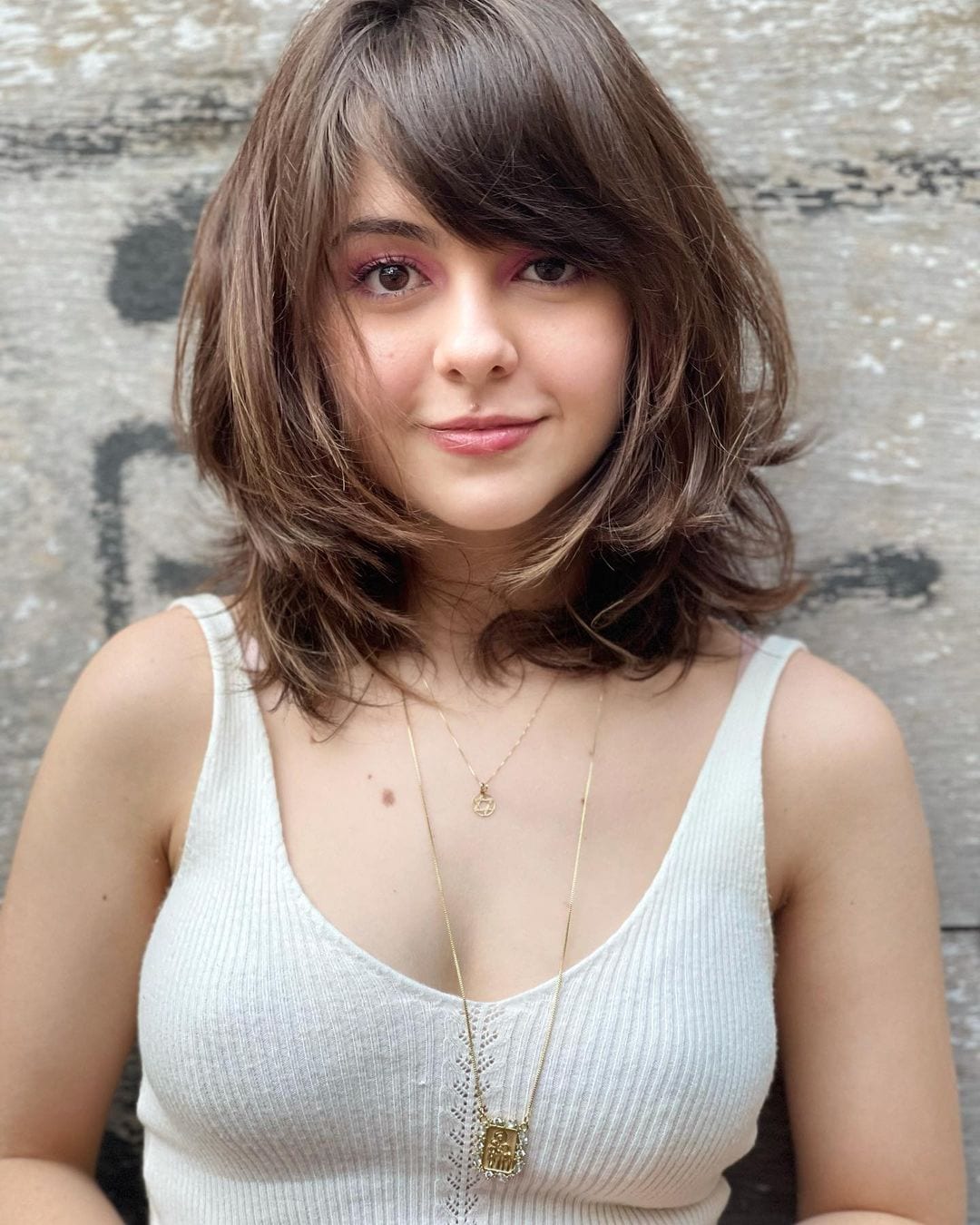 corte de cabelo prático com franja longa