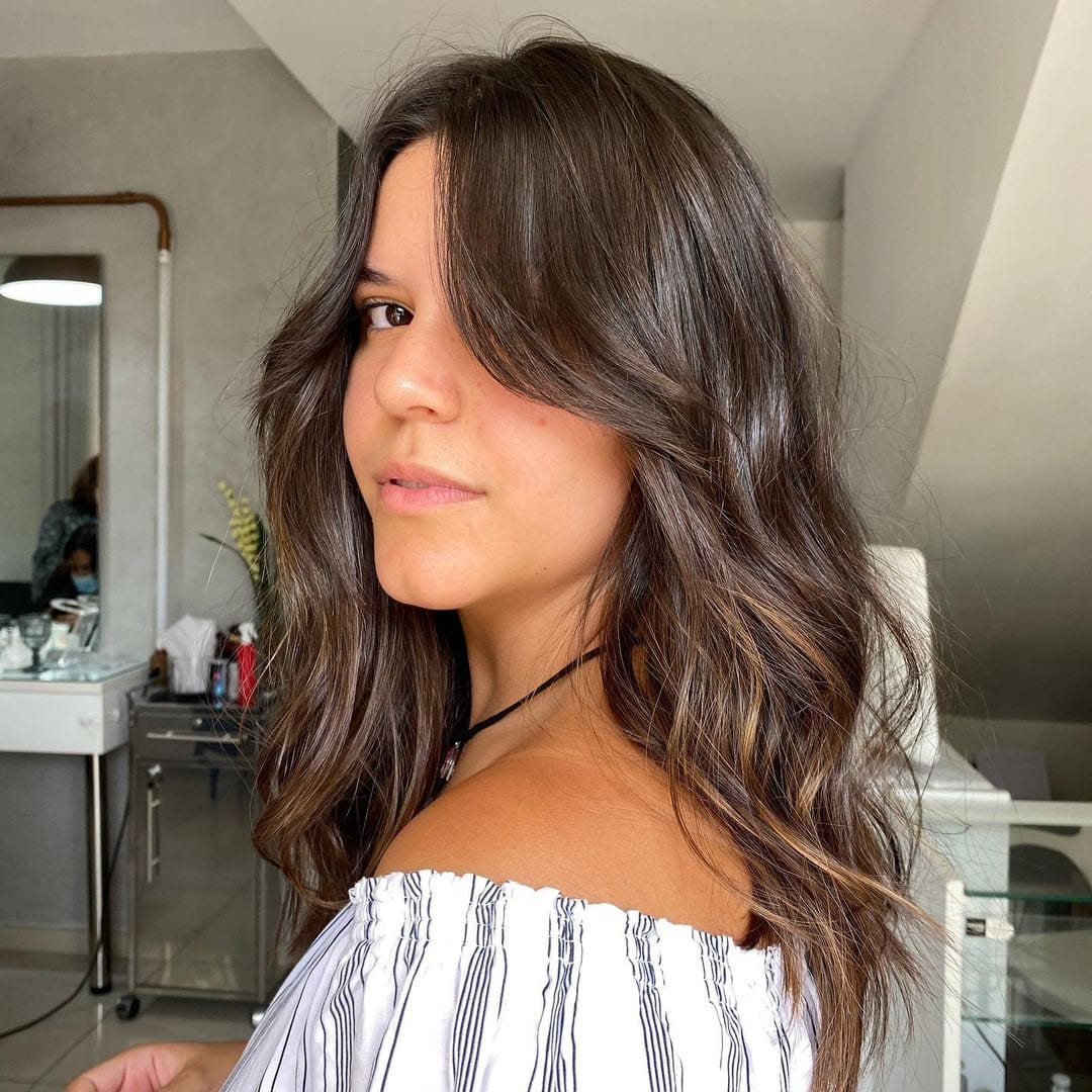 corte médio com franja longa para 2026