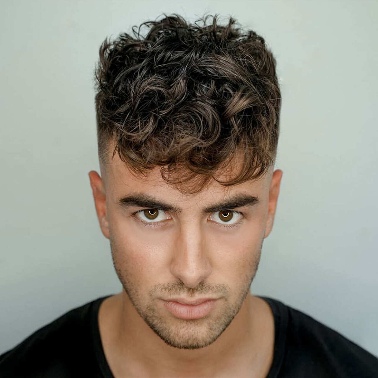 corte médio para rosto redondo cabelo ondulado