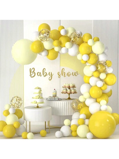 decoração de festa amarelo branco e dourado