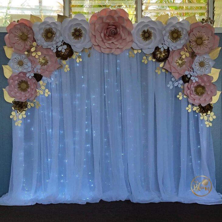 como fazer flores de papel gigantes para painel de festa