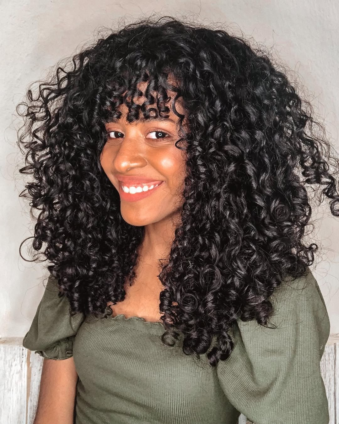 quanto custa cortar franja em cabelo cacheado