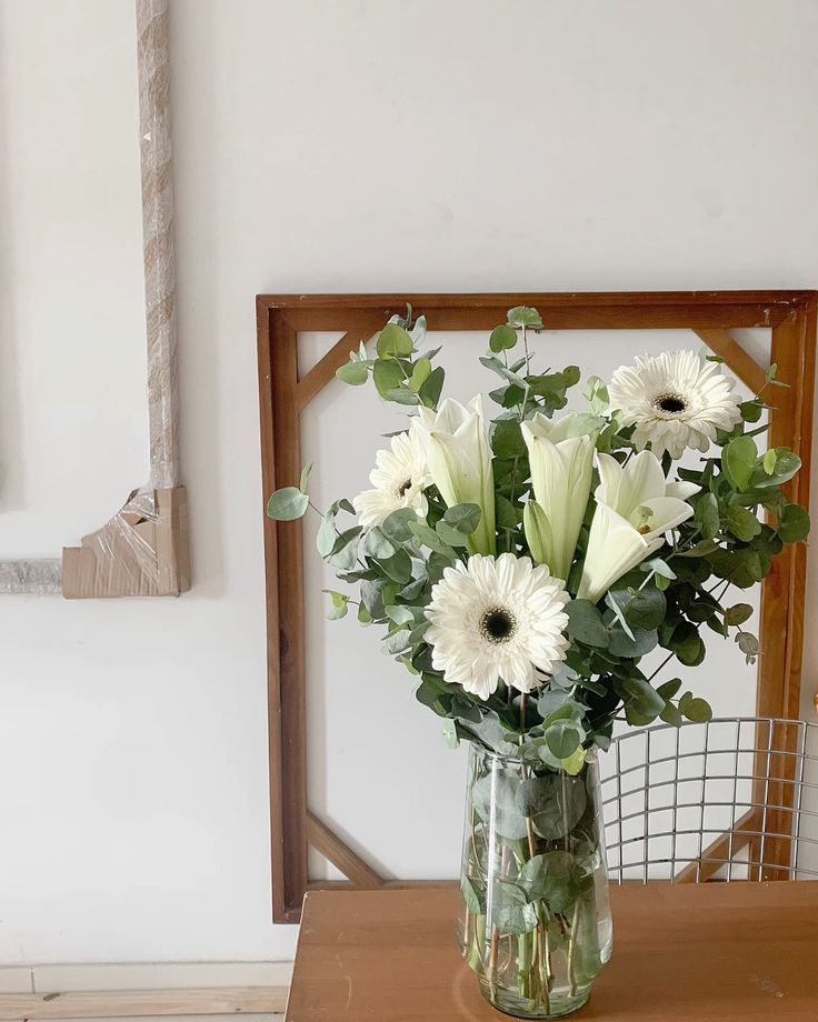 ideias arranjos de flores para sala