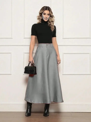 look saia longa com bota cano curto