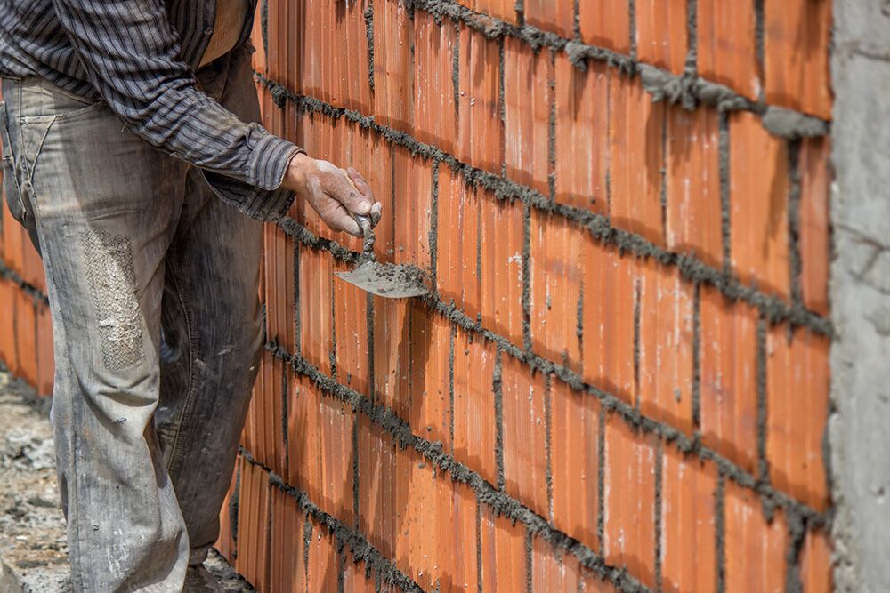 muro de tijolos com portão