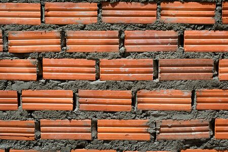 muro de tijolos com blocos de concreto