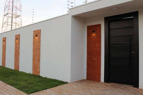 fachada de muro com portão