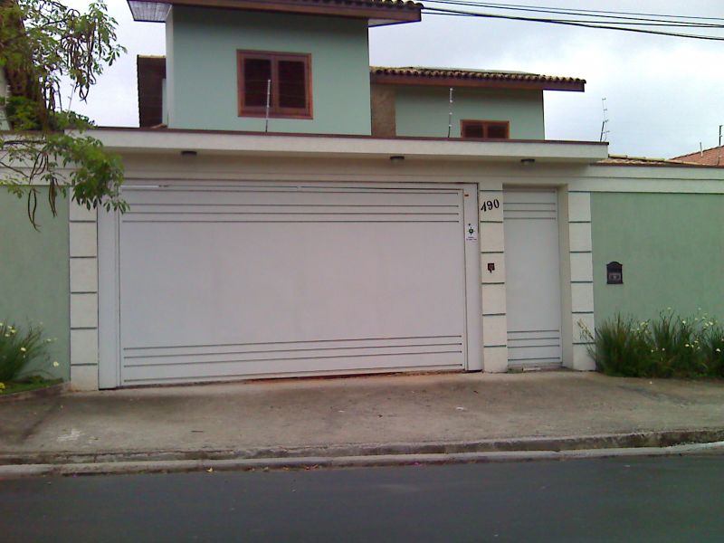 muro simples com portão de concreto