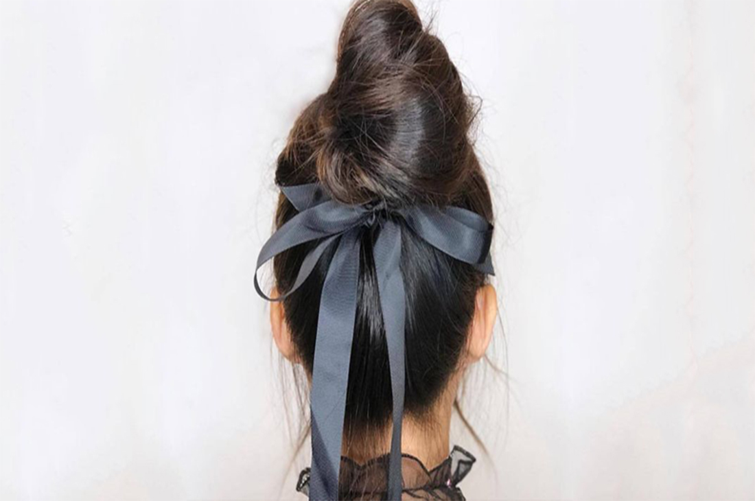 penteado com laço grande para natal