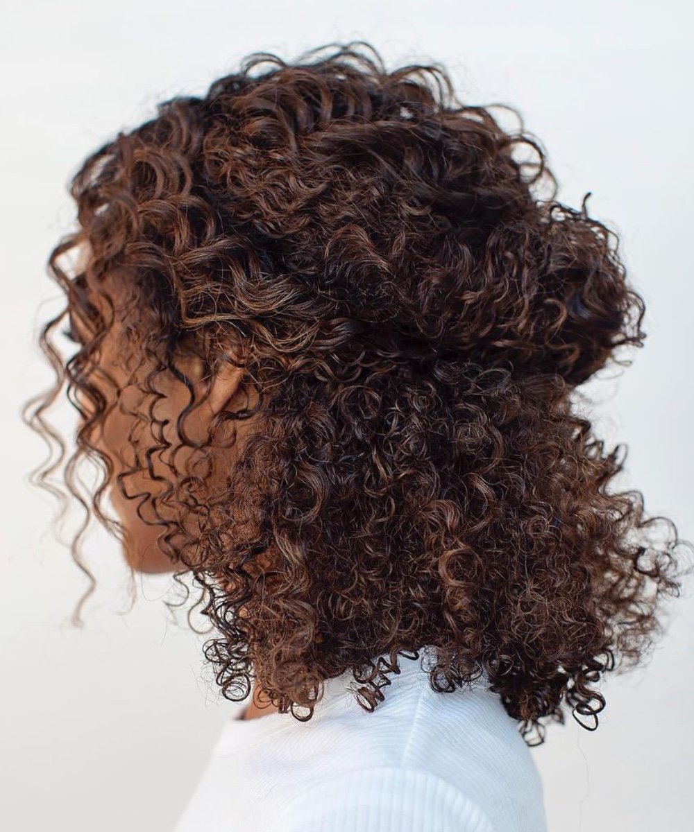 coque alto ou coque baixo desestruturado qual o melhor para cachos