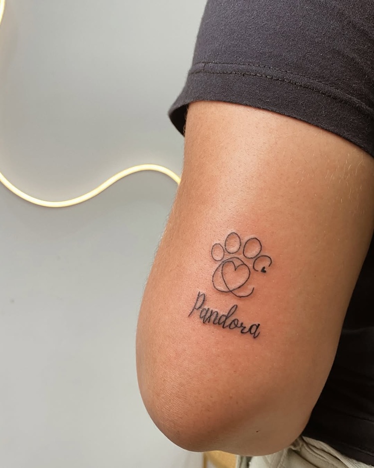 tatuagem patinha de cachorro