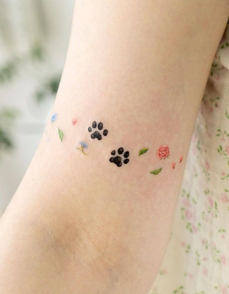 tatuagem patinha de cachorro