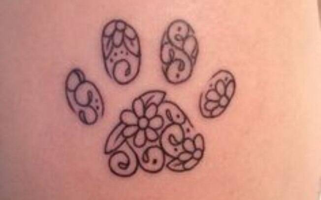 tatuagem patinha de cachorro