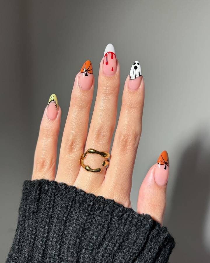 unhas halloween com teia de aranha