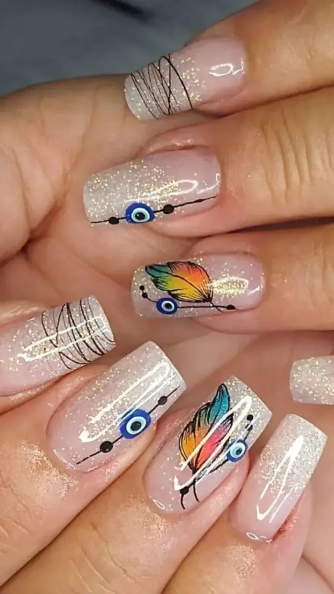 unhas decoradas com olho grego